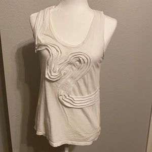 Sleeveless white ruffle top
